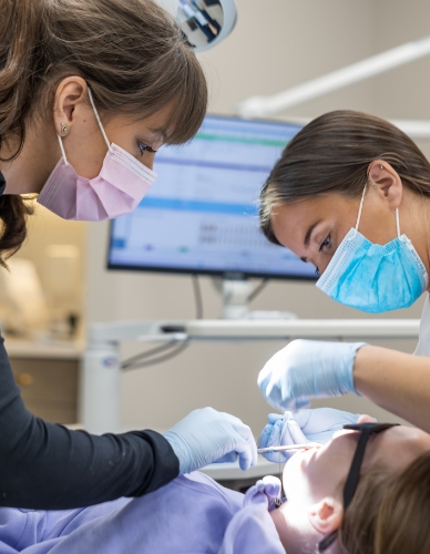 Orthodontist looking at digital smile impressions